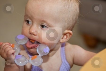 To use this stock image in your creative project, please select the size you need over to the right and click the "Add to Cart" button.
Your downloaded image will come with the Cutcaster watermark removed so don’t worry about the watermark you see on this page. Teething stock photo, Teething is the process by which an infant's teeth sequentially appear by breaking through the gums. by Mariusz Jurgielewicz
