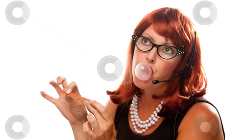 To use this stock image in your creative project, please select the size you need over to the right and click the "Add to Cart" button.
Your downloaded image will come with the Cutcaster watermark removed so don’t worry about the watermark you see on this page. Red Haired Retro Receptionist stock photo, Red Haired Retro Receptionist Blowing a Bubble Isolated on a White Background. by Andy Dean
