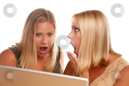 To use this stock image in your creative project, please select the size you need over to the right and click the "Add to Cart" button.
Your downloaded image will come with the Cutcaster watermark removed so don’t worry about the watermark you see on this page. Two Shocked Women Using Laptop stock photo, Two Shocked Women Using Laptop Isolated on a White Background. by Andy Dean