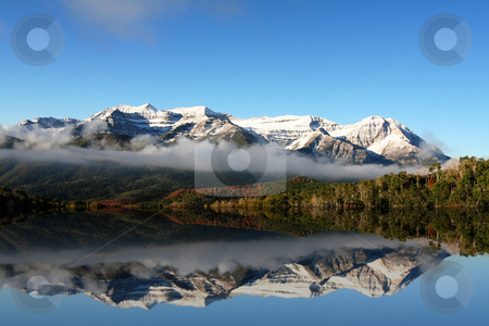 To use this stock image in your creative project, please select the size you need over to the right and click the "Add to Cart" button.
Your downloaded image will come with the Cutcaster watermark removed so don’t worry about the watermark you see on this page. Mountain Reflections stock photo, High mountain lake in the fall showing autumn colors reflected in the water
Americana by Mark Smith