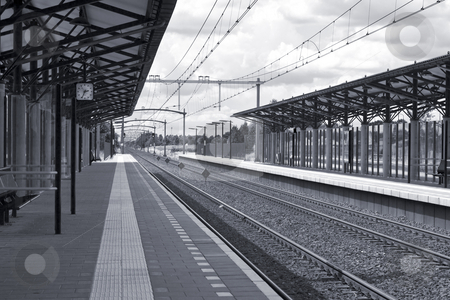 To use this stock image in your creative project, please select the size you need over to the right and click the "Add to Cart" button.
Your downloaded image will come with the Cutcaster watermark removed so don’t worry about the watermark you see on this page. Railway Station (Monochrome) stock photo, Monochrome photo of a railway station in the Netherlands. High contrast with a hint of a blue tint to make it look a little cooler. by Inge Schepers