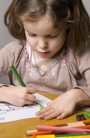 To use this stock image in your creative project, please select the size you need over to the right and click the "Add to Cart" button.
Your downloaded image will come with the Cutcaster watermark removed so don’t worry about the watermark you see on this page. Little girl drawing stock photo, Little girl drawing a picture with coloured pens by Jandrie Lombard