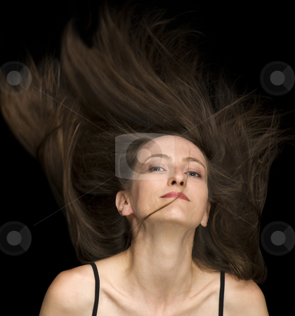 To use this stock image in your creative project, please select the size you need over to the right and click the "Add to Cart" button.
Your downloaded image will come with the Cutcaster watermark removed so don’t worry about the watermark you see on this page. Fly Hair stock photo, Fly hair fashion hair style by Desislava Draganova
