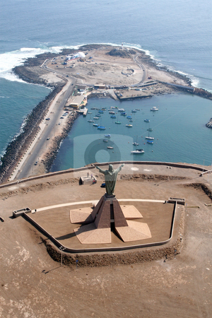 To use this stock image in your creative project, please select the size you need over to the right and click the "Add to Cart" button.
Your downloaded image will come with the Cutcaster watermark removed so don’t worry about the watermark you see on this page. Christ overlooking Arica's bay in Chile stock photo, Aereal view of Arica and it's huge sculpture of Christ overlooking the Bay and the ex-island by Philip Muller