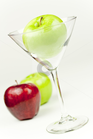 To use this stock image in your creative project, please select the size you need over to the right and click the "Add to Cart" button.
Your downloaded image will come with the Cutcaster watermark removed so don’t worry about the watermark you see on this page. Apple Martini stock photo, A Martini glass with an apple inside by Patrick Noonan