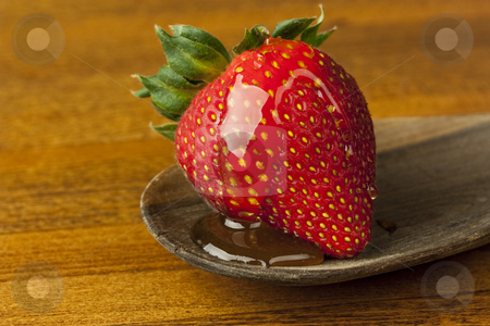To use this stock image in your creative project, please select the size you need over to the right and click the "Add to Cart" button.
Your downloaded image will come with the Cutcaster watermark removed so don’t worry about the watermark you see on this page. Strawberry with Honey stock photo, A strawberry with a honey glaze by Patrick Noonan