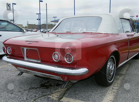 To use this stock image in your creative project, please select the size you need over to the right and click the "Add to Cart" button.
Your downloaded image will come with the Cutcaster watermark removed so don’t worry about the watermark you see on this page. 1964 Chevrolet Corvair stock photo, 1964 Chevrolet Corvair Monza 900 Convertible from rear passenger side, by Dazz Lee Photography