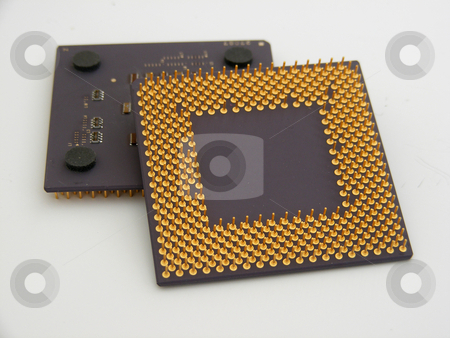 To use this stock image in your creative project, please select the size you need over to the right and click the "Add to Cart" button.
Your downloaded image will come with the Cutcaster watermark removed so don’t worry about the watermark you see on this page. Cpus 1 stock photo, A pair of CPUs with gold pins by Stuart Atton
