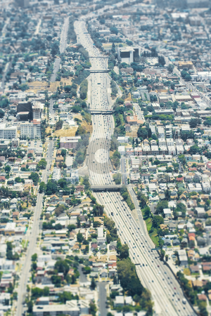 To use this stock image in your creative project, please select the size you need over to the right and click the "Add to Cart" button.
Your downloaded image will come with the Cutcaster watermark removed so don’t worry about the watermark you see on this page. Aerial Los Angeles stock photo, Aerial view of the 101 freeway in Los Angeles, California. by Brite Blue Spot