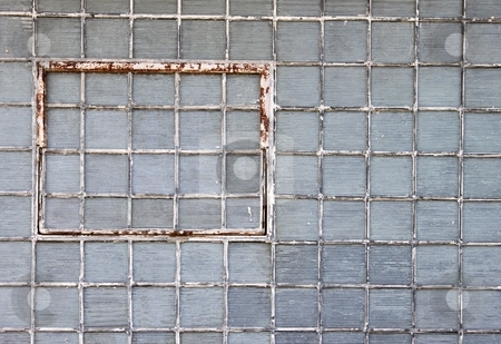 To use this stock image in your creative project, please select the size you need over to the right and click the "Add to Cart" button.
Your downloaded image will come with the Cutcaster watermark removed so don’t worry about the watermark you see on this page. Glass Brick Wall stock photo, Glass brick wall with a rusty window by Henrik Lehnerer