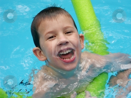To use this stock image in your creative project, please select the size you need over to the right and click the "Add to Cart" button.
Your downloaded image will come with the Cutcaster watermark removed so don’t worry about the watermark you see on this page. Boy swimming stock photo, Very happy child swimming by Cora Reed