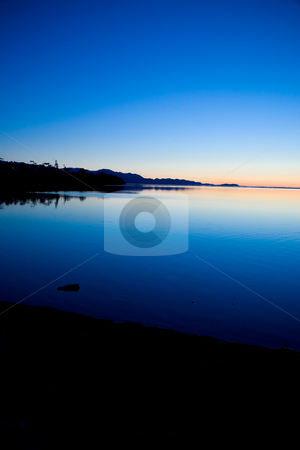 To use this stock image in your creative project, please select the size you need over to the right and click the "Add to Cart" button.
Your downloaded image will come with the Cutcaster watermark removed so don’t worry about the watermark you see on this page. Pacific Northwest Sunset stock photo, Sunset at Cline Spit in Sequim Washington. by Travis Manley