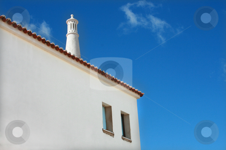 To use this stock image in your creative project, please select the size you need over to the right and click the "Add to Cart" button.
Your downloaded image will come with the Cutcaster watermark removed so don’t worry about the watermark you see on this page. House stock photo, White house chimney and blue sky by Marc Torrell
