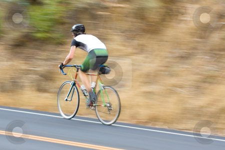 To use this stock image in your creative project, please select the size you need over to the right and click the "Add to Cart" button.
Your downloaded image will come with the Cutcaster watermark removed so don’t worry about the watermark you see on this page. Man cyclist racing past stock photo, A man cyclist racing by at high speed by Hieng Ling Tie