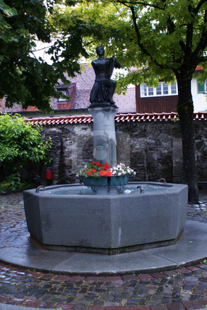 To use this stock image in your creative project, please select the size you need over to the right and click the "Add to Cart" button.
Your downloaded image will come with the Cutcaster watermark removed so don’t worry about the watermark you see on this page. Old Fountain in with minstrel Bregenz stock photo, Brunnen mit Minnes???nger in bregenzer Altstadt / Old Fountain in with minstrel Bregenz by Thomas K?