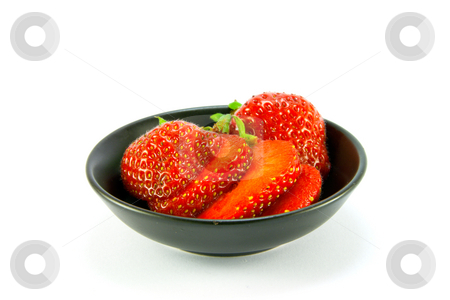 To use this stock image in your creative project, please select the size you need over to the right and click the "Add to Cart" button.
Your downloaded image will come with the Cutcaster watermark removed so don’t worry about the watermark you see on this page. Strawberries in a Small Black Dish stock photo, Sliced and whole red fresh strawberries in a small black dish on a white background by Keith Wilson