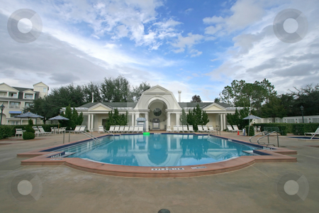 To use this stock image in your creative project, please select the size you need over to the right and click the "Add to Cart" button.
Your downloaded image will come with the Cutcaster watermark removed so don’t worry about the watermark you see on this page. Swimming Pool stock photo, A Big Swimming Pool in Central Florida by Lucy Clark