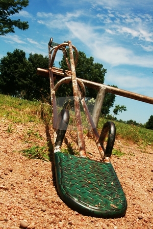 To use this stock image in your creative project, please select the size you need over to the right and click the "Add to Cart" button.
Your downloaded image will come with the Cutcaster watermark removed so don’t worry about the watermark you see on this page. Teeter totter stock photo, by Margaret Roew