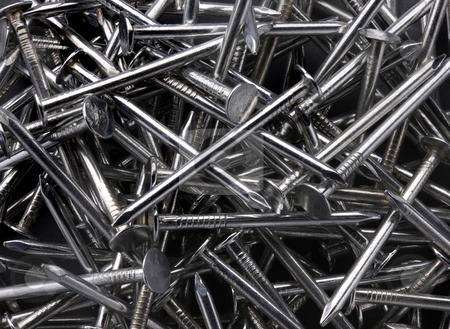 To use this stock image in your creative project, please select the size you need over to the right and click the "Add to Cart" button.
Your downloaded image will come with the Cutcaster watermark removed so don’t worry about the watermark you see on this page. Shiny Roofing Nails stock photo, Close-up shot of dozens of shiny 2 inch roofing nails by James Barber