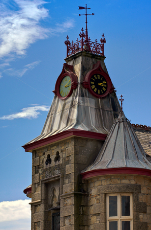 To use this stock image in your creative project, please select the size you need over to the right and click the "Add to Cart" button.
Your downloaded image will come with the Cutcaster watermark removed so don’t worry about the watermark you see on this page. Town Hall Clock stock photo, 15.11pm on the town hall clock in Marazion Cornwall by Robert Ford