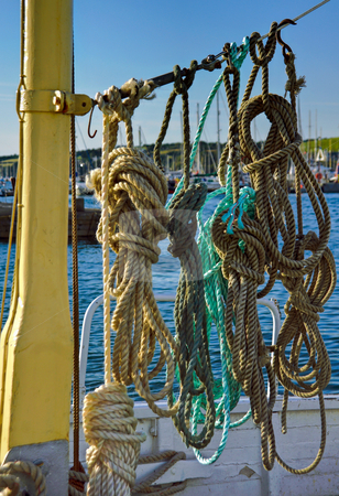 To use this stock image in your creative project, please select the size you need over to the right and click the "Add to Cart" button.
Your downloaded image will come with the Cutcaster watermark removed so don’t worry about the watermark you see on this page. Ropes on Boat Deck stock photo, Neatly prepared ropes on a boat deck in Falmouth harbour Cornwall by Robert Ford