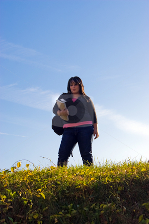 To use this stock image in your creative project, please select the size you need over to the right and click the "Add to Cart" button.
Your downloaded image will come with the Cutcaster watermark removed so don’t worry about the watermark you see on this page. Student On Campus stock photo, A young woman walking on campus on a nice day with her books and backpack. by Todd Arena
