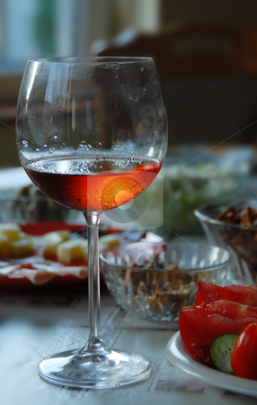 To use this stock image in your creative project, please select the size you need over to the right and click the "Add to Cart" button.
Your downloaded image will come with the Cutcaster watermark removed so don’t worry about the watermark you see on this page. Wineglass with highlighted rose wine stock photo, Wineglass with highlighted rose wine on served table by Julija Sapic