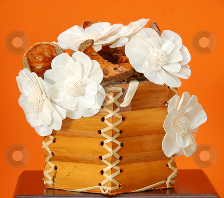 To use this stock image in your creative project, please select the size you need over to the right and click the "Add to Cart" button.
Your downloaded image will come with the Cutcaster watermark removed so don’t worry about the watermark you see on this page. Flower bouquet over orange stock photo, White dry flowers decorative ikebana over orange background by Julija Sapic