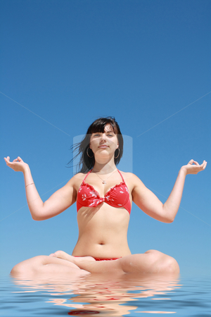 To use this stock image in your creative project, please select the size you need over to the right and click the "Add to Cart" button.
Your downloaded image will come with the Cutcaster watermark removed so don’t worry about the watermark you see on this page. Brunette relaxation on the beach stock photo, Sexual brunette relaxation on the beach by Sergii Mogyla