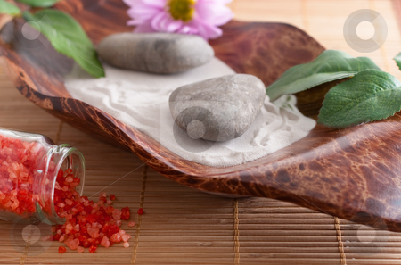 To use this stock image in your creative project, please select the size you need over to the right and click the "Add to Cart" button.
Your downloaded image will come with the Cutcaster watermark removed so don’t worry about the watermark you see on this page. Bath salt, massage stones, bowl and sand, flower stock photo, Massage stones on sand in a bowl, a purple flower and red bath salt by Alexander Zschach