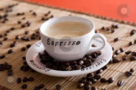 To use this stock image in your creative project, please select the size you need over to the right and click the "Add to Cart" button.
Your downloaded image will come with the Cutcaster watermark removed so don’t worry about the watermark you see on this page. Coffee cup stock photo, A espresso cup with coffee beans as decoration by Alexander Zschach