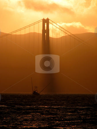 To use this stock image in your creative project, please select the size you need over to the right and click the "Add to Cart" button.
Your downloaded image will come with the Cutcaster watermark removed so don’t worry about the watermark you see on this page. Golden Gate Sunset stock photo, A sunset at the Golden Gate Bridge with Fisher-Boat in foreground by Alexander Zschach
