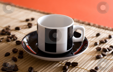 To use this stock image in your creative project, please select the size you need over to the right and click the "Add to Cart" button.
Your downloaded image will come with the Cutcaster watermark removed so don’t worry about the watermark you see on this page. Coffee cup stock photo, A espresso cup with coffee beans as decoration by Alexander Zschach