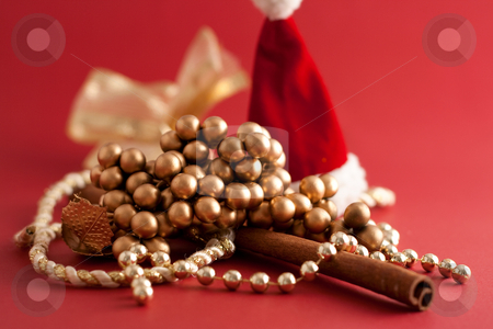 To use this stock image in your creative project, please select the size you need over to the right and click the "Add to Cart" button.
Your downloaded image will come with the Cutcaster watermark removed so don’t worry about the watermark you see on this page. Christmas Theme stock photo, Chains, Santa Claus hat and cinnamon stick by Alexander Zschach