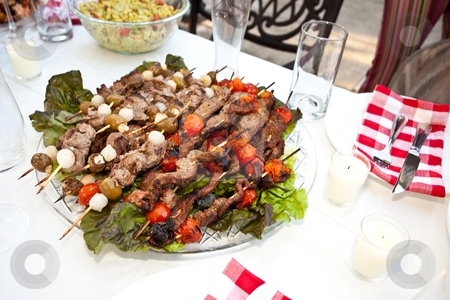 To use this stock image in your creative project, please select the size you need over to the right and click the "Add to Cart" button.
Your downloaded image will come with the Cutcaster watermark removed so don’t worry about the watermark you see on this page. Kebabs stock photo, Kebab refers to a variety of meat dishes in Mediterranean, Caucasian, Central Asian, South Asian and some of the African cuisines, consisting of grilled or broiled meats on a skewer or stick. by Mariusz Jurgielewicz