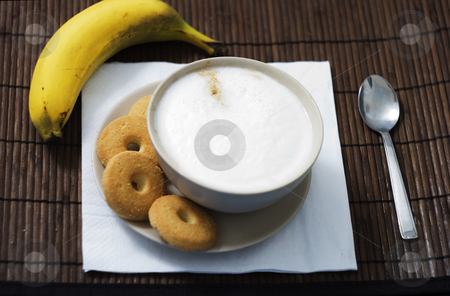 To use this stock image in your creative project, please select the size you need over to the right and click the "Add to Cart" button.
Your downloaded image will come with the Cutcaster watermark removed so don’t worry about the watermark you see on this page. Breakfast stock photo, Breakfast with a cup of cappuccino with four biscuits and a banana by Fabio Alcini