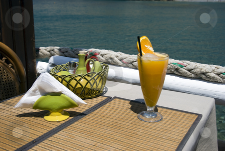 To use this stock image in your creative project, please select the size you need over to the right and click the "Add to Cart" button.
Your downloaded image will come with the Cutcaster watermark removed so don’t worry about the watermark you see on this page. Tropical drink stock photo, Tropical drink on a terasse in greece placa matala by Chris Willemsen