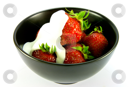 To use this stock image in your creative project, please select the size you need over to the right and click the "Add to Cart" button.
Your downloaded image will come with the Cutcaster watermark removed so don’t worry about the watermark you see on this page. Strawberries and Cream stock photo, Whole red ripe strawberries with cream in a black bowl on a white background by Keith Wilson