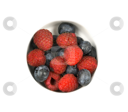 To use this stock image in your creative project, please select the size you need over to the right and click the "Add to Cart" button.
Your downloaded image will come with the Cutcaster watermark removed so don’t worry about the watermark you see on this page. Raspberries and Blueberries stock photo, Raspberries and blue berries on white with copyspace by John Teeter