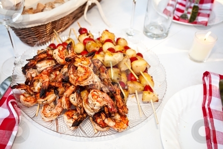 To use this stock image in your creative project, please select the size you need over to the right and click the "Add to Cart" button.
Your downloaded image will come with the Cutcaster watermark removed so don’t worry about the watermark you see on this page. Kebabs stock photo, Kebab refers to a variety of meat dishes in Mediterranean, Caucasian, Central Asian, South Asian and some of the African cuisines, consisting of grilled or broiled meats on a skewer or stick. by Mariusz Jurgielewicz