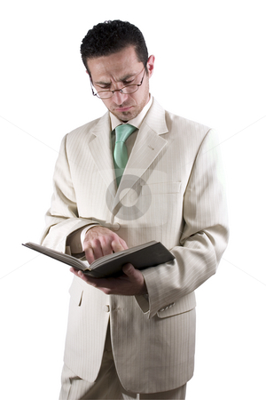 To use this stock image in your creative project, please select the size you need over to the right and click the "Add to Cart" button.
Your downloaded image will come with the Cutcaster watermark removed so don’t worry about the watermark you see on this page. Businessman with a pair of glassed reading a book stock photo, Isolated businessman with a pair of glassed reading a book by Mehmet Dilsiz