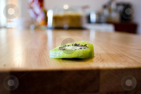 To use this stock image in your creative project, please select the size you need over to the right and click the "Add to Cart" button.
Your downloaded image will come with the Cutcaster watermark removed so don’t worry about the watermark you see on this page. Sliced Kiwi on the Kitchen Table stock photo, Close up on a sliced kiwi on the kitchen table by Mehmet Dilsiz