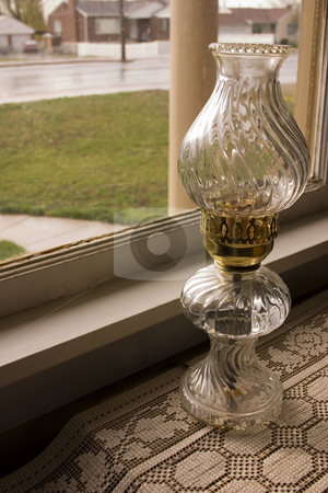 To use this stock image in your creative project, please select the size you need over to the right and click the "Add to Cart" button.
Your downloaded image will come with the Cutcaster watermark removed so don’t worry about the watermark you see on this page. Antique Lamp by the Window stock photo, Antique Lamp by the Window in an old House by Mehmet Dilsiz