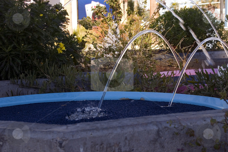 To use this stock image in your creative project, please select the size you need over to the right and click the "Add to Cart" button.
Your downloaded image will come with the Cutcaster watermark removed so don’t worry about the watermark you see on this page. Jumping Waters stock photo, Landscape Design - Jumping Water Fountains by Mehmet Dilsiz