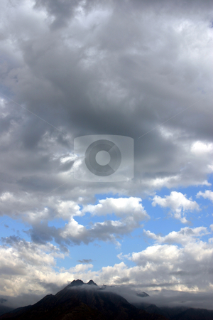 To use this stock image in your creative project, please select the size you need over to the right and click the "Add to Cart" button.
Your downloaded image will come with the Cutcaster watermark removed so don’t worry about the watermark you see on this page. Cloudy Mountains stock photo, Clouds around the mountain by Mehmet Dilsiz