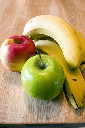 To use this stock image in your creative project, please select the size you need over to the right and click the "Add to Cart" button.
Your downloaded image will come with the Cutcaster watermark removed so don’t worry about the watermark you see on this page. Apples and Bananas stock photo, Close up on a Red, Green Apple and Bananas by Mehmet Dilsiz