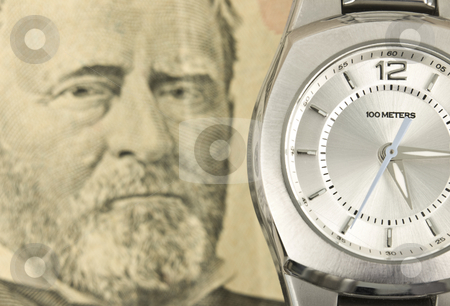 To use this stock image in your creative project, please select the size you need over to the right and click the "Add to Cart" button.
Your downloaded image will come with the Cutcaster watermark removed so don’t worry about the watermark you see on this page. Time is Money stock photo, Time is money concept with cash and watch by John Teeter