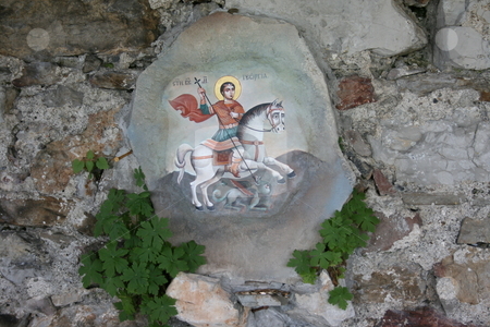To use this stock image in your creative project, please select the size you need over to the right and click the "Add to Cart" button.
Your downloaded image will come with the Cutcaster watermark removed so don’t worry about the watermark you see on this page. Saint George stock photo, Icon of Saint George painted on stone by Minka Ruskova-Stefanova