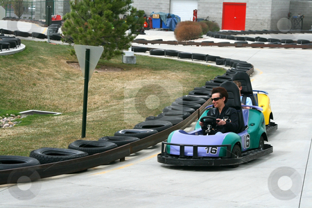 To use this stock image in your creative project, please select the size you need over to the right and click the "Add to Cart" button.
Your downloaded image will come with the Cutcaster watermark removed so don’t worry about the watermark you see on this page. Woman on the Go Cart stock photo, Woman racing on the Go Cart by Mehmet Dilsiz