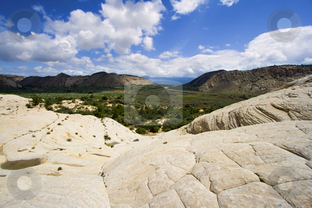 To use this stock image in your creative project, please select the size you need over to the right and click the "Add to Cart" button.
Your downloaded image will come with the Cutcaster watermark removed so don’t worry about the watermark you see on this page. Looking down the Sandstones in to Snow Canyon - Utah stock photo, Snow Canyon in St. George, Utah - Sandstones by Mehmet Dilsiz
